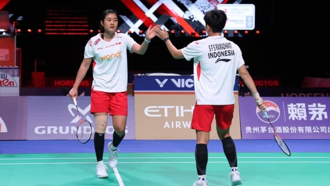 
 Marc Marquez saat merayakan kemenangan di Sprint Race MotoGP Spanyol dan aksi tim Uber Indonesia. (Foto: RSS)