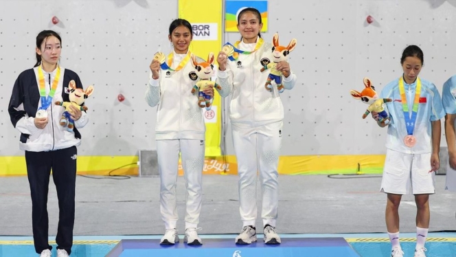 
 Aksi heroik Duo Putri Speed Relay Indonesia saat memastikan medali emas dan rekor baru di Asian Beach Games Sanya 2026. (Foto: RSS)