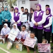 Ketua Umum TP PKK Tri Tito Karnavian saat menyapa warga di Huntara Aceh Utara dalam rangka peringatan Hari Posyandu Nasional 2026. (Foto: RSS)
