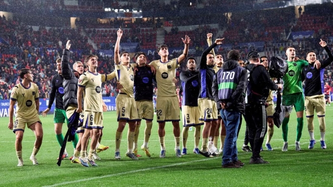 
 Skuad FC Barcelona merayakan kemenangan krusial yang membawa mereka selangkah lagi menuju tangga juara La Liga. (Foto: RSS)
