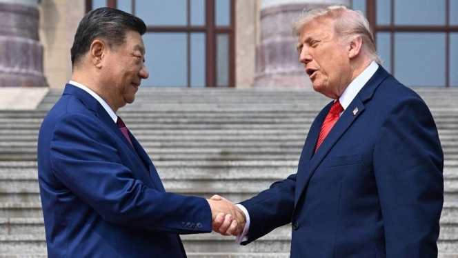 
 Presiden AS Donald Trump dan Presiden China Xi Jinping saat melakukan pembicaraan diplomatik di Beijing terkait keamanan jalur maritim global. (Foto: RSS)